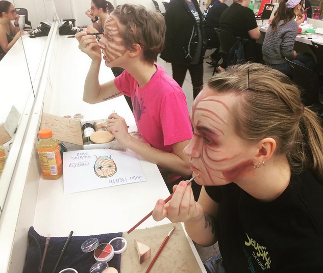 Applying stage make-up